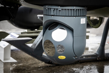 Camera sensor pods under a surveillance helicopter