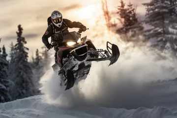 Rolgordijnen Snowmobiler navigating challenging snowy terrains and trails © thejokercze