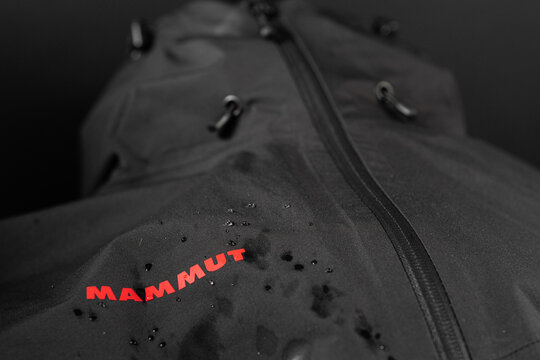 Kyiv, Ukraine, - July 8, 2023 Mammut technology and water drops. Water drops on fabric. Breathable fabric.
