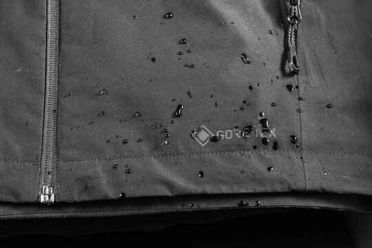 Kyiv, Ukraine, - July 8, 2023 Gore-tex technology and water drops. Water drops on fabric. Breathable fabric.