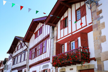 Traditional and colorful half-timbered houses in the old town of Ainhoa