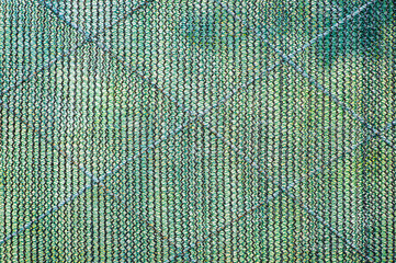 Background, texture of a checkered mesh made of fabric. Protection from insects in the garden.