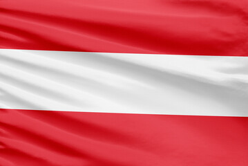 Fototapeta premium Austria flag is depicted on a sport stitch cloth fabric with folds
