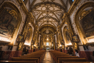 Fototapeta premium Beautiful church of Santa Isabel seen from the interior with gold details, located in the City of Tlaxcala, Mexico