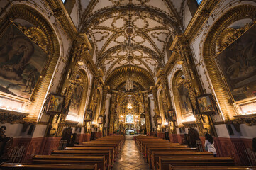 Beautiful church of Santa Isabel seen from the interior with gold details, located in the City of Tlaxcala, Mexico