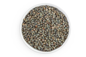Obraz na płótnie Canvas raw french green lentils in ceramic bowl isolated on white background. Top view. Flat lay