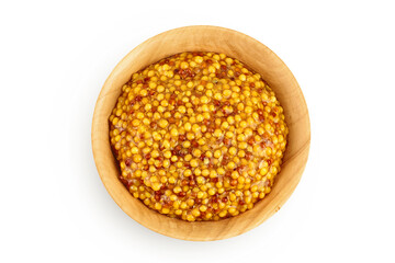 french mustard in wooden bowl isolated on white background with full depth of field. Top view. Flat lay.