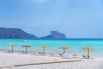 beach with umbrellas and chairs in Altea, spain