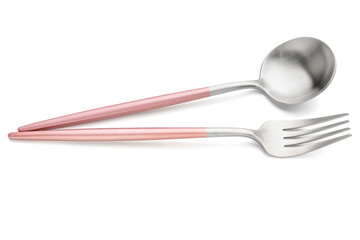 Stainless steel fork and spoon with pink handles on white background