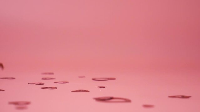 Falling red hearts on a pink background, love story Valentine Day