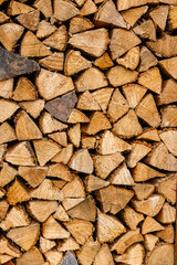 Pile of chopped fire wood prepared for winter, texture, background,
