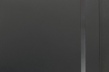 Matte black steel background.
