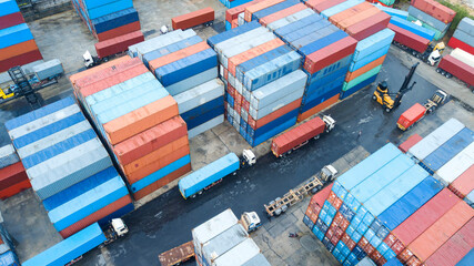 Fototapeta premium Logistics and transportation of Container Cargo ship and Refrigerated container being loaded on a container ship