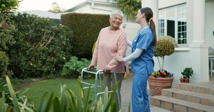 Walker, walking and caregiver help senior woman at a retirement home as support and care in a backyard. Movement, recovery and nurse with elderly person for rehabilitation at outdoor house for health