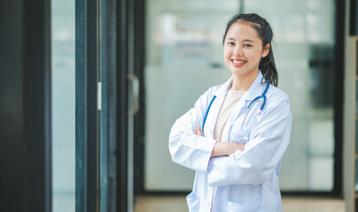 Portrait doctor with a stethoscope stands confidently ready to provide health care to patients in hospitals or clinics.