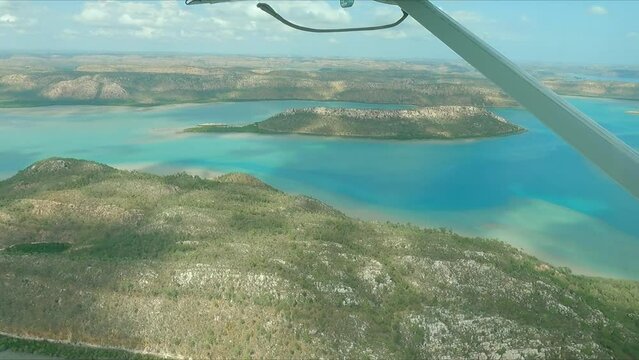 Aerial view of the clear blue seas of Cygnet Bay