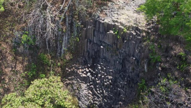 Los Tercios Falls in dry season, no water on columnar basalt cliff