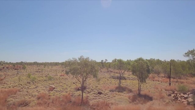 Driving over a bridge and a dry riverbed in Western Australia