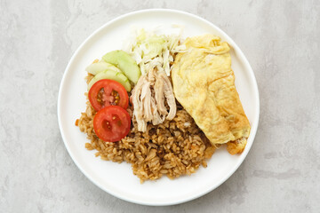 Nasi Goreng Telur Dadar, popular traditional Indonesian street food
