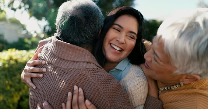 Mexican family, hug and smile for reunion, outdoors and love for support, retirement and care. Elderly parents and daughter, visit and happy in backyard, bonding and embrace for quality time at home