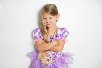 A cute Caucasian little girl in a Halloween costume. Child in a costume