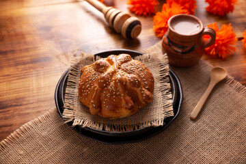 Pan de Muerto. Typical Mexican sweet bread with sesame seeds, that is consumed in the season of the day of the dead. It is a main element in the altars and offerings in the festivity