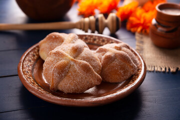 Pan de Muerto. Typical Mexican sweet bread that is consumed in the season of the day of the dead. It is a main element in the altars and offerings in the festivity of the day of the dead.