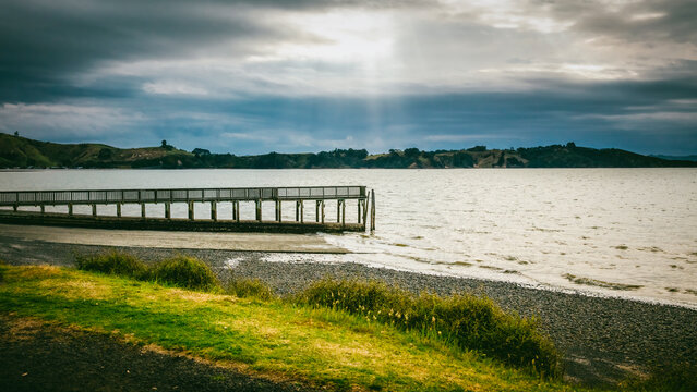 Wooden jetty of Kawakawa Bay  in Manukau New Zealand	