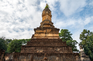 Ancient pagoda in Wat Chedi Jet Thaew the largest temple compound in Si Satchanalai Historical Park of Sukhothai province of Thailand.