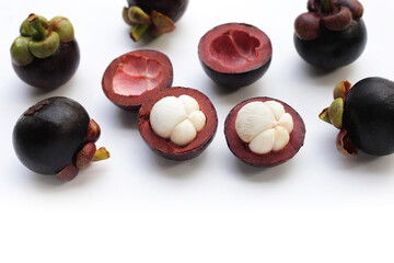 Fresh mangosteen fruit on white background.