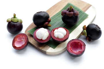 Fresh mangosteen fruit on white background.