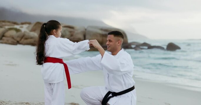 Beach, karate or fitness with a father and daughter together outdoor for a self defense workout. Training, family and kids with a man parent teaching his girl child how to fight by the sea or ocean
