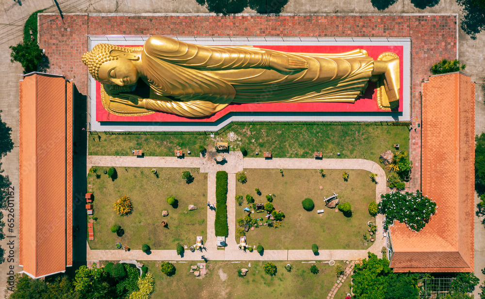 Wall mural sleeping buddha at laem pho temple in aerial view from top. ko yo, songkhla, thailand.