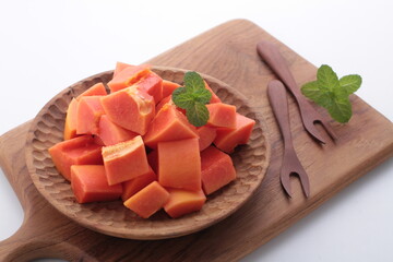 ripe and sweet papaya fruit on gray background