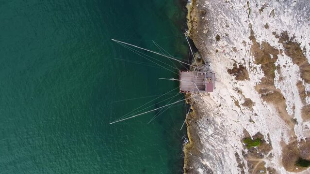 Traditional old Fisher House Trabucco at an italian sea coast