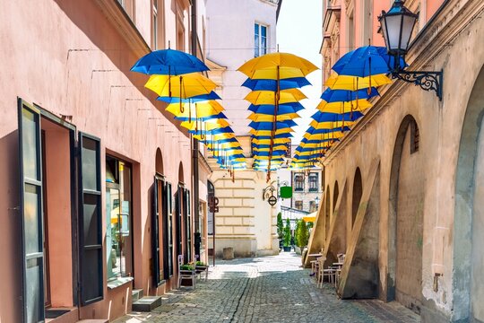 Street with colorful umbrellas in Tarnow, Poland.