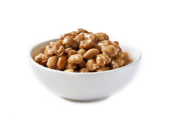 natto or fermented soybean in white bowl isolated background. natto or fermented soybean in white...
