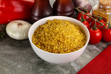 Dry wheat bulgur cereal heap