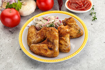Grilled chicken wings with sauce