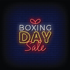 Neon Sign boxing day sale with brick wall background vector