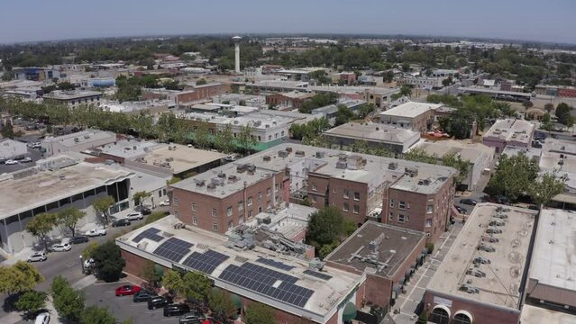 Lodi, California, USA - July 16, 2021: Sunlight shines on the historic downtown buildings and churches of Lodi.
