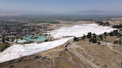 Pamukkale Travertenleri, 
Travertine terrace of Pamukkale aerial shot,
natural pool with blue water, Turkey tourist attraction. 