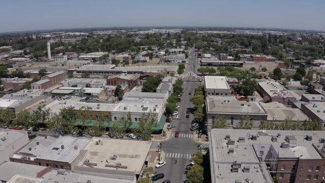 Lodi, California, USA - July 16, 2021: Sunlight shines on the historic downtown buildings and churches of Lodi.