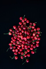 cherries sweet on the black background