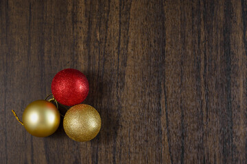 Christmas ornaments on wooden table with copy space. Christmas background.