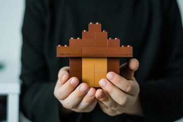 house made from a designer in children's hands