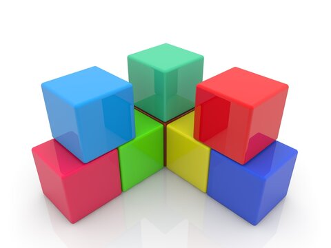 Stack of toy cubes on white
