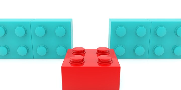 A red toy brick between a row of blue toy bricks