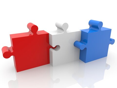 A white puzzle piece connected to a red and blue puzzle piece
