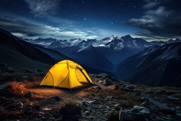 Fototapeta na wymiar yellow camping tent in the mountains at night under stars wide view from above